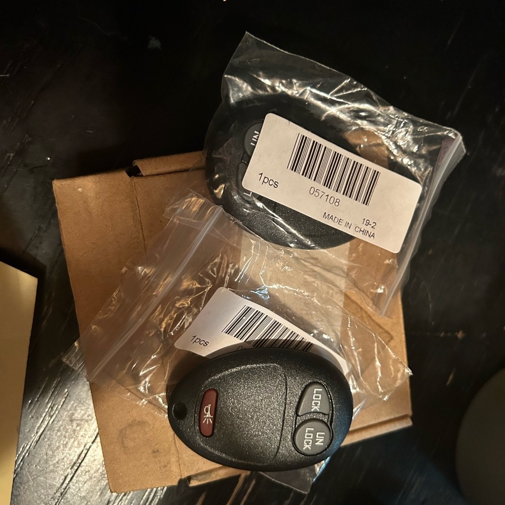 Bundle of two key fobs that fit a Chevrolet Silverado keyless remote